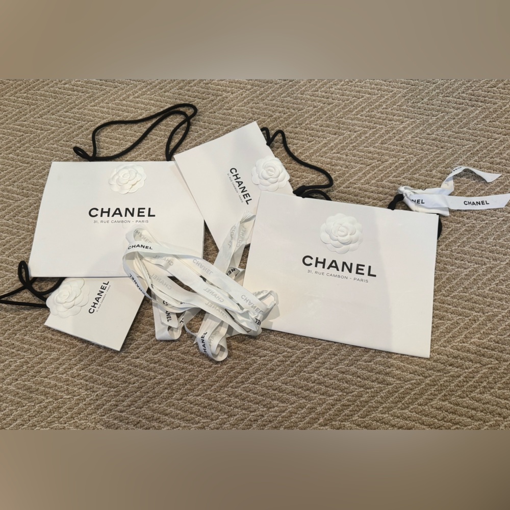 CHANEL Rue Cambon White Gift Bags with Camellia Embossed Detail and Ribbon